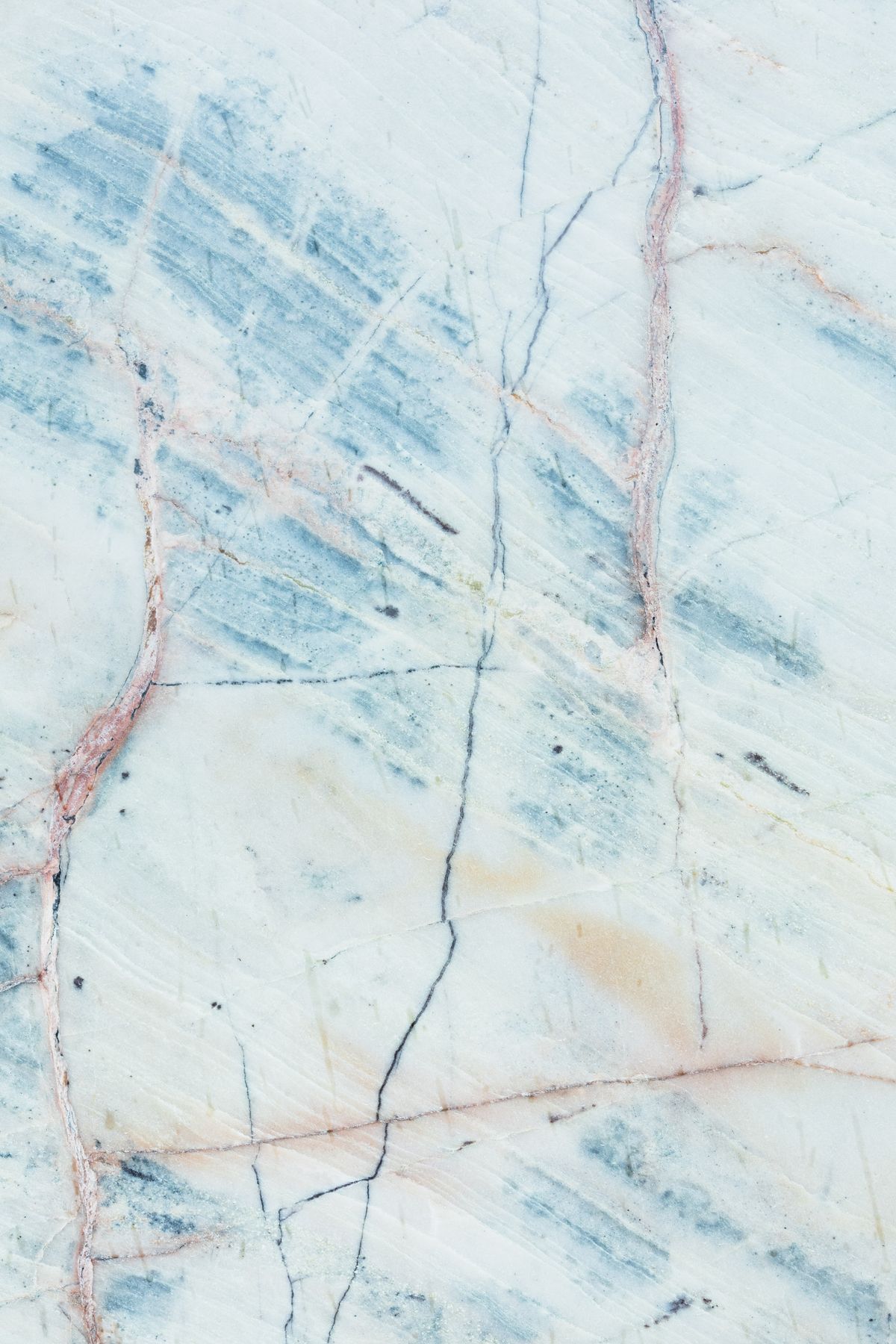 Marble slab close-up with flowing blue-grey natural veining