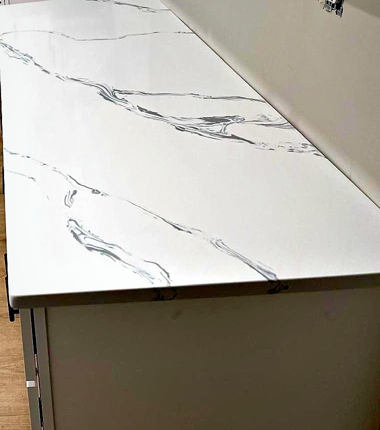 Calacatta-look marble countertop run installed by Stone Forever